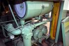 Used Sullair Air Cooled Rotary Screw Air Compressor, Model 25-200H ACAC. Approximately 900 cfm at 150 psig. Driven by a 250hp, 3/60/460 volt, 1770 rpm motor. Includes a control panel, and sound enclo...