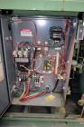 Used Sullair Air Cooled Rotary Screw Air Compressor, Model 25-200H ACAC. Approximately 900 cfm at 150 psig. Driven by a 250hp, 3/60/460 volt, 1770 rpm motor. Includes a control panel, and sound enclo...