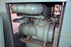 Used Sullair Air Cooled Rotary Screw Air Compressor, Model 25-200H ACAC. Approximately 900 cfm at 150 psig. Driven by a 250hp, 3/60/460 volt, 1770 rpm motor. Includes a control panel, and sound enclo...