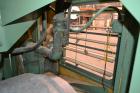 Used Sullair Air Cooled Rotary Screw Air Compressor, Model 25-200H ACAC. Approximately 900 cfm at 150 psig. Driven by a 250hp, 3/60/460 volt, 1770 rpm motor. Includes a control panel, and sound enclo...