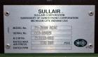 Used Sullair Air Cooled Rotary Screw Air Compressor, Model 25-200H ACAC. Approximately 900 cfm at 150 psig. Driven by a 250hp, 3/60/460 volt, 1770 rpm motor. Includes a control panel, and sound enclo...