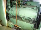 Used Sullair Rotary Screw Air Compressor, model LS-10. Approximately 111 cfm at 100 psig. Approximately 100 psi, and a 25 hp motor. Includes a sound enclosure. Missing controls, 51094 hours on meter....