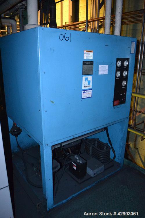 Used Hankison Compressed Air Dryer, Model 80700 CU. Rated capacity 30875 BTU/HR at 35 degrees F. evap., & 100 degrees F. amb. Maximum pressure 200 psig. Refrigerant charge 11 lbs of R-22. Refrigerant...