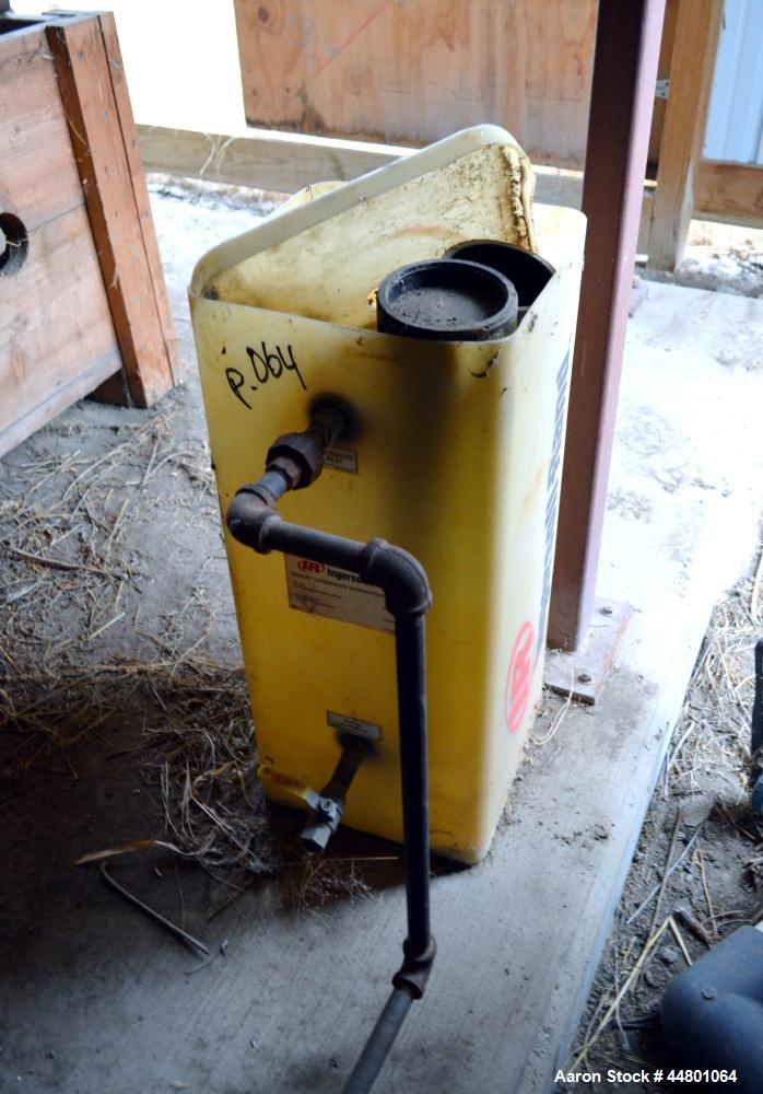 Used Ingersoll-Rand Desiccant Air Dryer, Model TZM088.  Approximately 20 cfm, maximum working pressure 152 psi. Serial #51087A, serial #2003.  Includes a holding tank, (2) filters, and a model PS-060...
