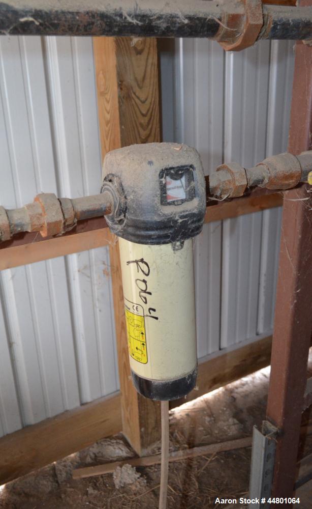 Used Ingersoll-Rand Desiccant Air Dryer, Model TZM088.  Approximately 20 cfm, maximum working pressure 152 psi. Serial #51087A, serial #2003.  Includes a holding tank, (2) filters, and a model PS-060...