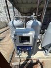 Used Quincy QHD635 twin-tower heatless desiccant air dryer system, manufactured in 2022, complete with integrated control cubicle and pre-/post-filtration assemblies. The unit includes two vertical d...