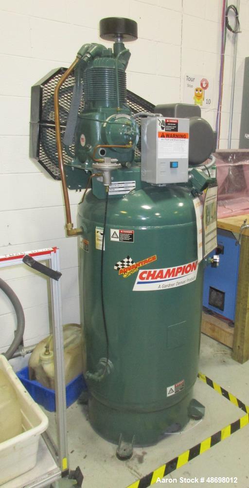Used Champion Air Compressor, Approx 5 HP. Tank mounted, Reciprocating.