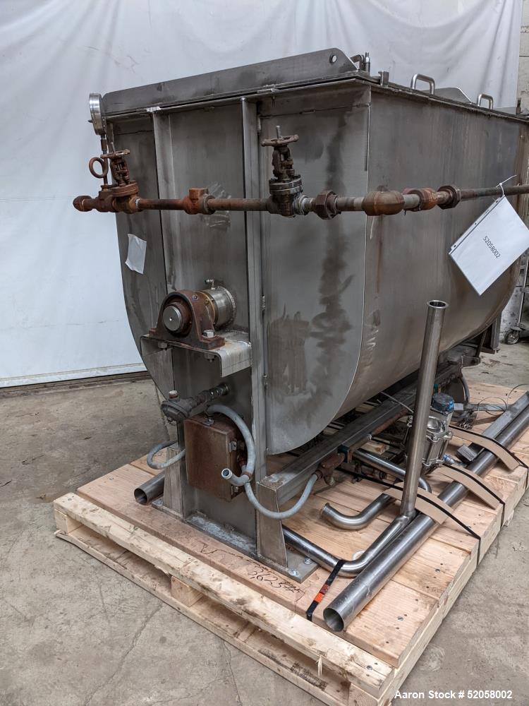 Used Jacketed Double Spiral Ribbon Blender / Chocolate Melter, 304 Stainless Steel. Approximate 40 Cubic Feet working capacity. Jacketed trough approximately 36" wide x 60" long x 42" deep. Jacket ra...