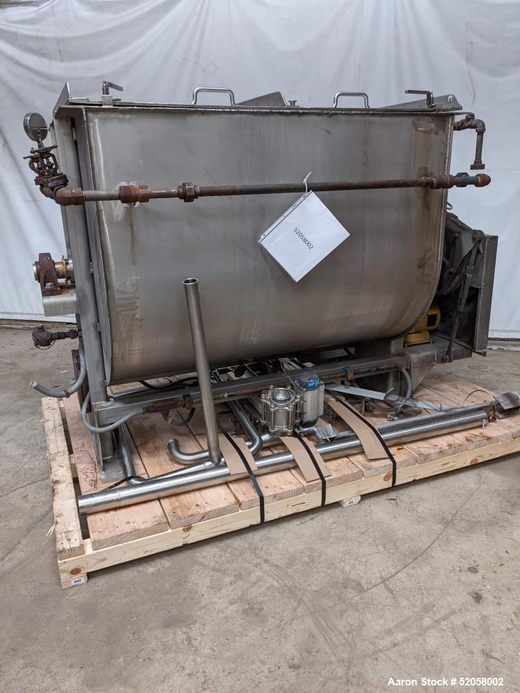 Used Jacketed Double Spiral Ribbon Blender / Chocolate Melter, 304 Stainless Steel. Approximate 40 Cubic Feet working capacity. Jacketed trough approximately 36" wide x 60" long x 42" deep. Jacket ra...