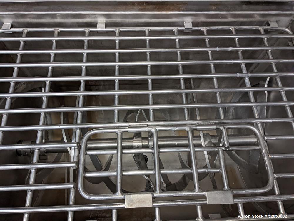 Used Jacketed Double Spiral Ribbon Blender / Chocolate Melter, 304 Stainless Steel. Approximate 40 Cubic Feet working capacity. Jacketed trough approximately 36" wide x 60" long x 42" deep. Jacket ra...