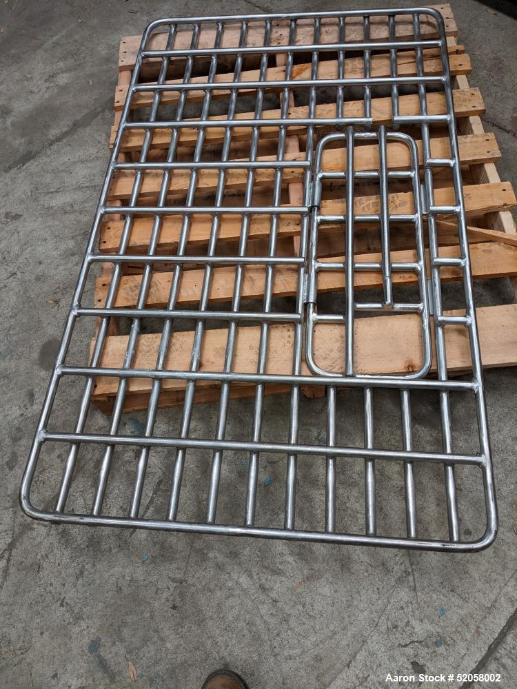 Used Jacketed Double Spiral Ribbon Blender / Chocolate Melter, 304 Stainless Steel. Approximate 40 Cubic Feet working capacity. Jacketed trough approximately 36" wide x 60" long x 42" deep. Jacket ra...
