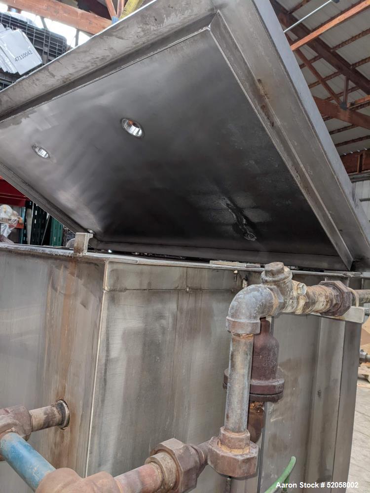 Used Jacketed Double Spiral Ribbon Blender / Chocolate Melter, 304 Stainless Steel. Approximate 40 Cubic Feet working capacity. Jacketed trough approximately 36" wide x 60" long x 42" deep. Jacket ra...