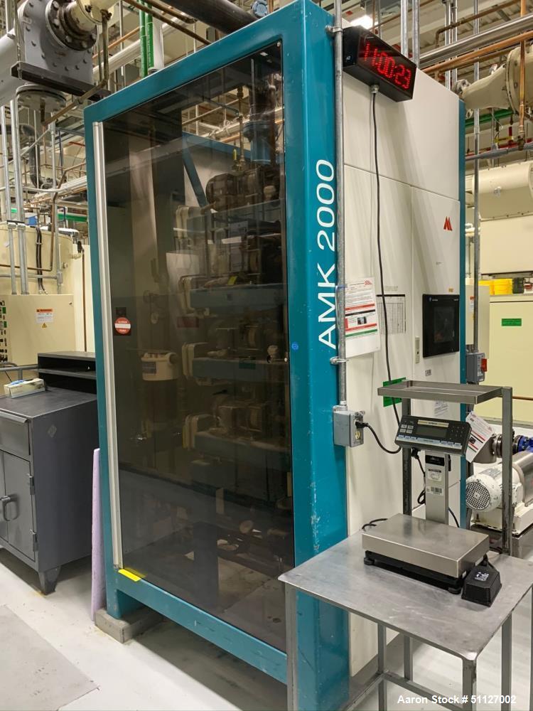 Used Aasted AMK 2000 Vertical Chocolate Tempering Machine.