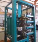 Used Aasted AMK 2000 Vertical Chocolate Tempering Machine.
