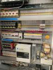 Used Aasted AMK 2000 Vertical Chocolate Tempering Machine.