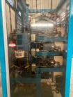 Used Aasted AMK 2000 Vertical Chocolate Tempering Machine.