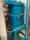 Used Aasted AMK 2000 Vertical Chocolate Tempering Machine.