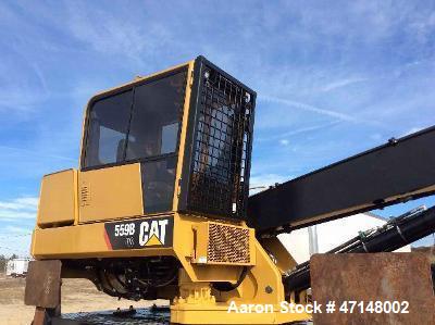 Used Cat 559B Knuckleboom Loader. Grapple: 5055TW-R50.  Delimber: CTR426. Trailer: Evans D-48-HD. Hours 4255.