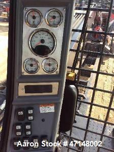 Used Cat 559B Knuckleboom Loader. Grapple: 5055TW-R50.  Delimber: CTR426. Trailer: Evans D-48-HD. Hours 4255.