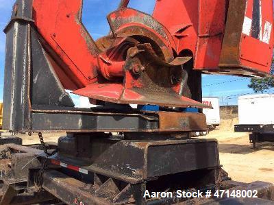 Used Cat 559B Knuckleboom Loader. Grapple: 5055TW-R50.  Delimber: CTR426. Trailer: Evans D-48-HD. Hours 4255.