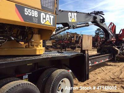 Used- Cat 559B Knuckleboom Loader. Grapple: 5055TW-R50.  Delimber: CTR426. Trailer: Evans D-48-HD. Hours 4255.