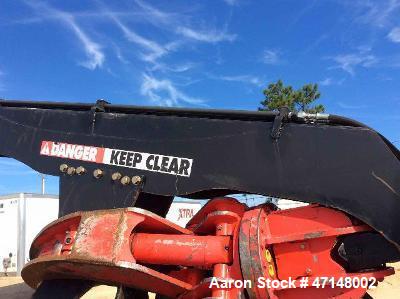 Used- Cat 559B Knuckleboom Loader. Grapple: 5055TW-R50.  Delimber: CTR426. Trailer: Evans D-48-HD. Hours 4255.