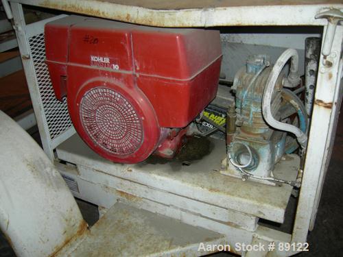 USED: Sprayforce fireproofing/plaster finishing machine, model Calibur. Includes a Wisconsin gas powered engine mixer and a gas powered pump. Unitized on a trailer. Built 1989.