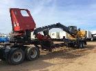 Used- Cat 559B Knuckleboom Loader. Grapple: 5055TW-R50.  Delimber: CTR426. Trailer: Evans D-48-HD. Hours 4255.