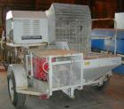 USED: Sprayforce fireproofing/plaster finishing machine, model Calibur. Includes a Wisconsin gas powered engine mixer and a gas powered pump. Unitized on a trailer. Built 1989.