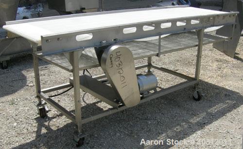 Used Belt Conveyor, 29" wide x 102" long plastic belt. Driven by a 1/2 hp, 3/60/230/460 volt, 1725 rpm motor with an Allen Bradley Powerflex 4 panel. Mounted on a 304 stainless steel frame with caste...