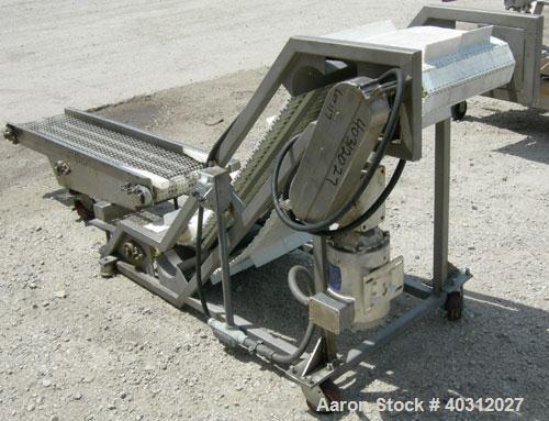Used Inclined "S" shaped conveyor, 304 stainless steel frame. 16" wide cleated plastic belt, 12" long bottom infeed section, 42" long incline section, 14" long top discharge section, approximate 40" ...