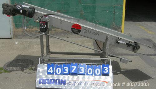 Used Sager Incline Belt Conveyor.  12" wide x approximately 80" long belt.  Driven by a 1 hp, 3/60/230/460 volt, 1725 rpm motor thru reducer, ratio 7.5:1.  Includes an E-trac AC inverter.  Mounted on...
