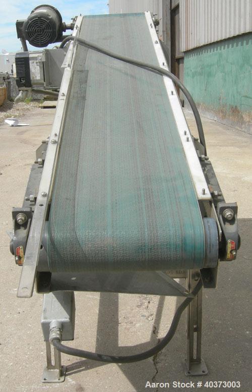Used Sager Incline Belt Conveyor.  12" wide x approximately 80" long belt.  Driven by a 1 hp, 3/60/230/460 volt, 1725 rpm motor thru reducer, ratio 7.5:1.  Includes an E-trac AC inverter.  Mounted on...