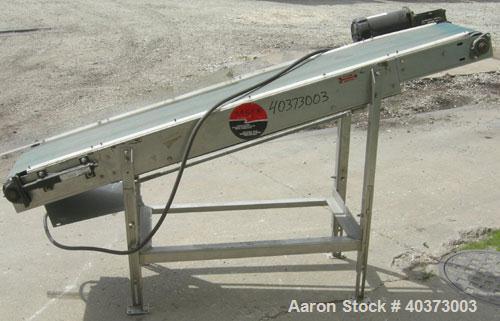 Used Sager Incline Belt Conveyor.  12" wide x approximately 80" long belt.  Driven by a 1 hp, 3/60/230/460 volt, 1725 rpm motor thru reducer, ratio 7.5:1.  Includes an E-trac AC inverter.  Mounted on...