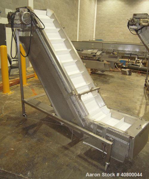 Used-Trio-Pac Inclined "S" Shaped Conveyor, 304 stainless steel frame. 14" wide x 3" tall cleated plastic belt, 24" long bot...