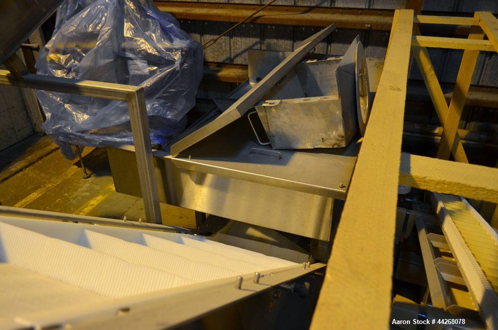 Used Inclined Belt Conveyor.  Belt;  24" wide x 13 long incline section, 48" bottom section, 36" top section.  112" discharge height.  End feed hopper, mounted on a Stainless Steel frame with casters...