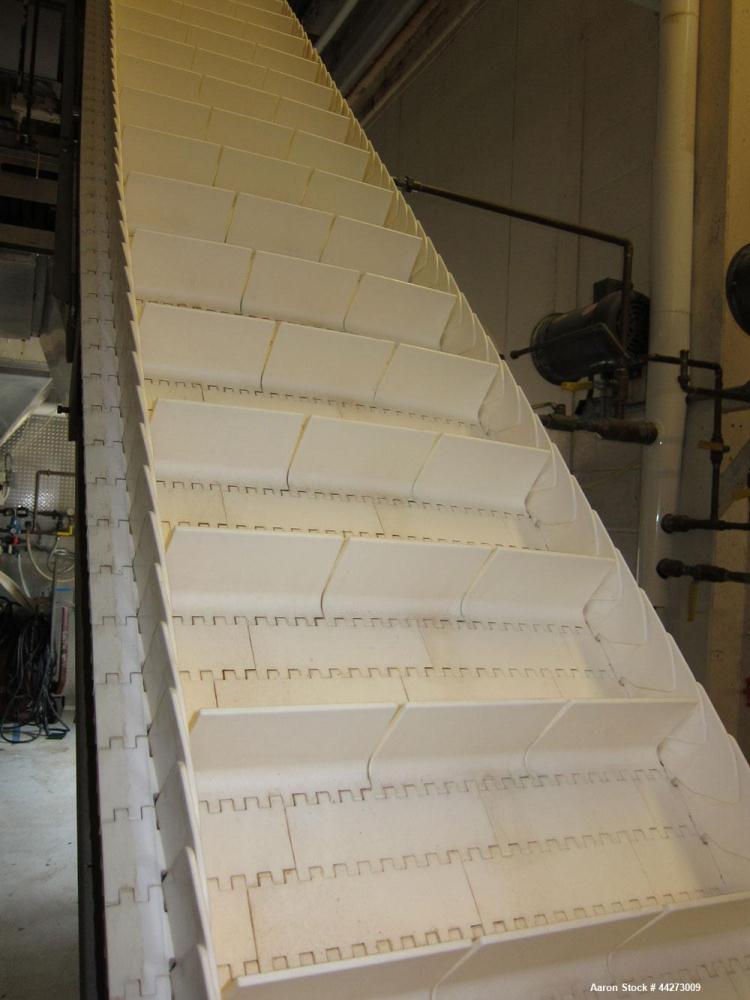 Used 17'' Wide x Approximate 13 ft High Inclined Plastic Interlocking Cleated Stainless Steel Conveyor