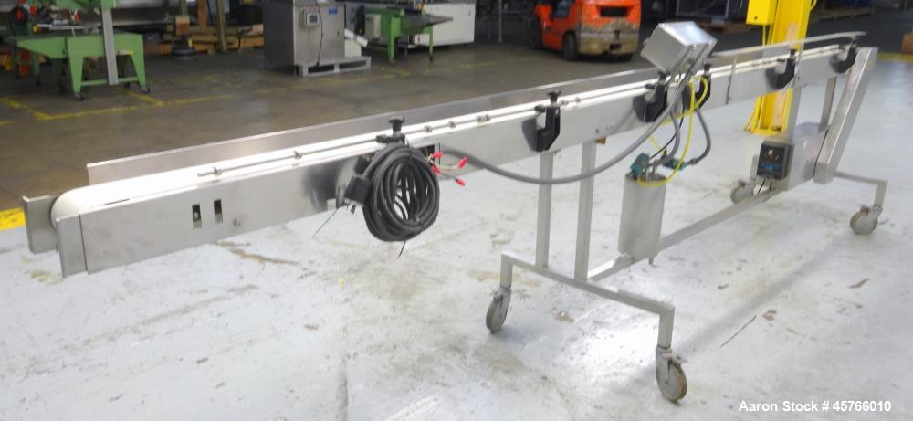 Used Takeaway Conveyor. Approximate 5" wide x 176" long rubber belt, driven by a hp gear motor with a Penta drive. Includes a Pneumatic ejector system with accumulation tank, and pipe manifold. (1) C...