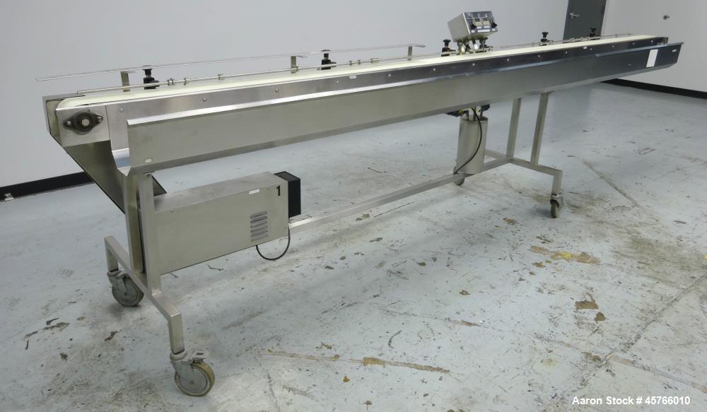 Used Takeaway Conveyor. Approximate 5" wide x 176" long rubber belt, driven by a hp gear motor with a Penta drive. Includes a Pneumatic ejector system with accumulation tank, and pipe manifold. (1) C...