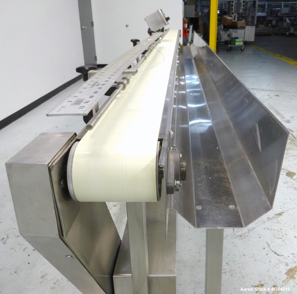 Used Takeaway Conveyor. Approximate 5" wide x 176" long rubber belt, driven by a hp gear motor with a Penta drive. Includes a Pneumatic ejector system with accumulation tank, and pipe manifold. (1) C...