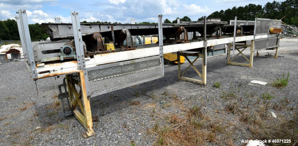 Used OFI Custom Metal Fabrication Rubber Belt Conveyor. Approximate 24" wide x 360" long belt. Overall Dimensions 33'OAL x 5'6"OAW x 5'10"OAH. Built 2007.