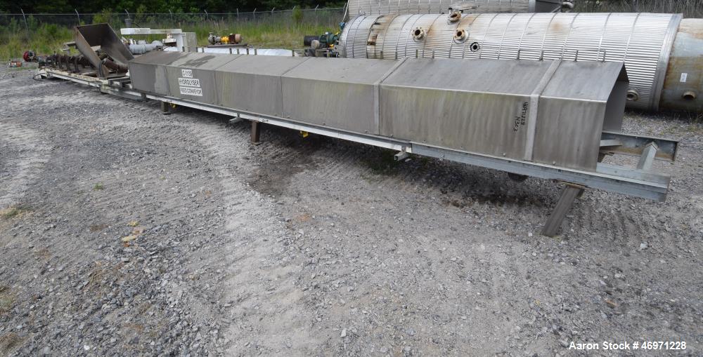 Used OFI Custom Metal Fabrication Rubber Belt Conveyor. Approximate 24" wide x 600" long belt. Overall Dimensions 60'OAL x 5'6"OAW x 5'10"OAH. Built 2007.