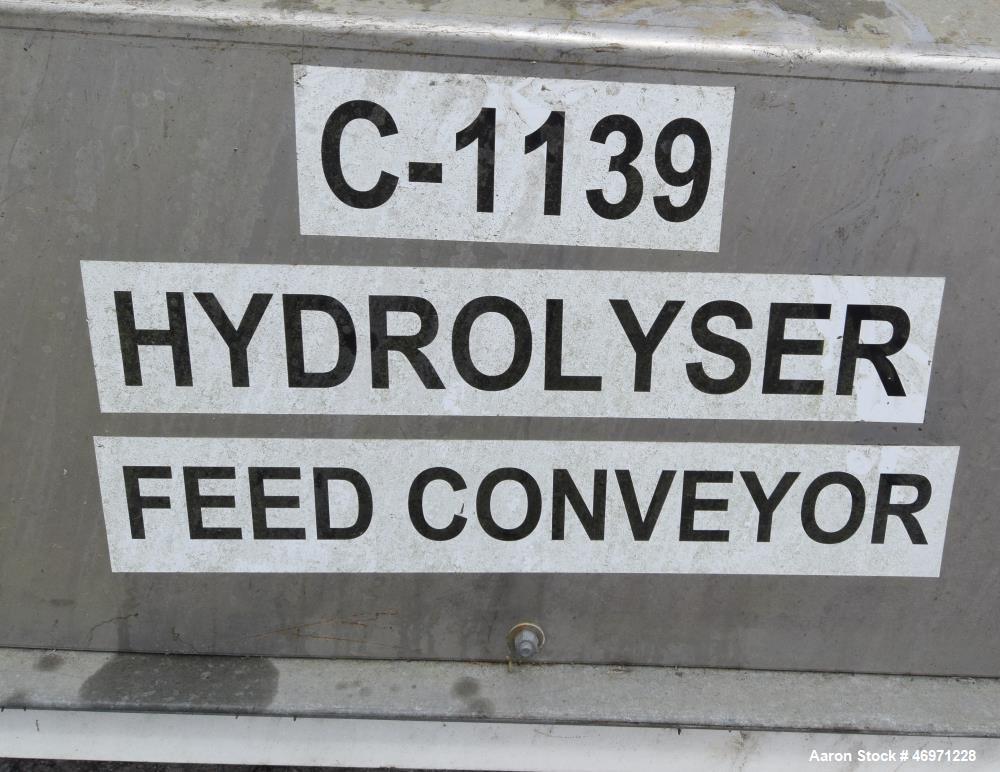 Used OFI Custom Metal Fabrication Rubber Belt Conveyor. Approximate 24" wide x 600" long belt. Overall Dimensions 60'OAL x 5'6"OAW x 5'10"OAH. Built 2007.