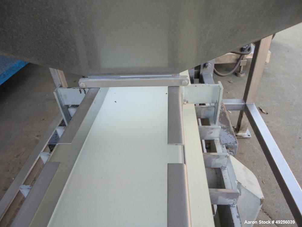 Used Belt infeed conveyor measuring 11" wide x 65" long x 25" high with stainless steel hopper measuring 40" x 40" x 4-1/2" straight side to 19" cone to 8" x 8" discharge. Unit is powered by 1/2 hp, ...