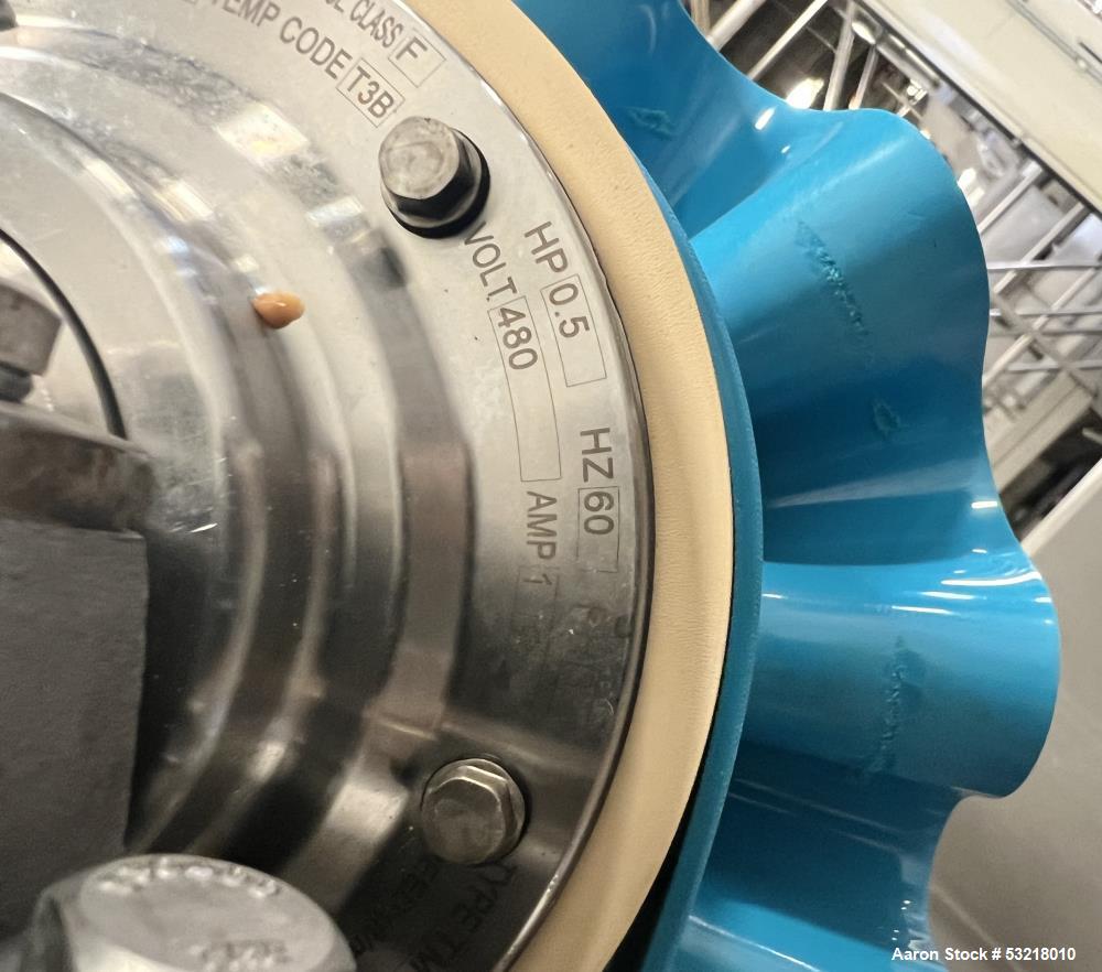 Used Rubber Belt Inclined Conveyor. Pleated belt approximate 23" wide x 13' long x 1-3/4" deep sides x 1-3/4" tall pleats. With VDG drum motor, stainless steel frame