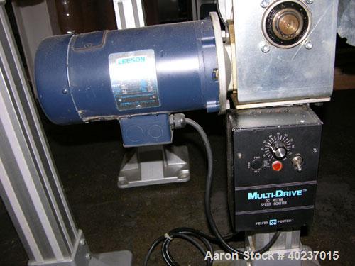Used Autopack "S" Style Slat Conveyor, 3.25" wide with 36", 12", 12" straight sections, on stand with .5 hp DC motor with SCR controller.

