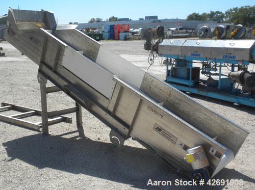 Used Bunting Magnetics Incline Belt Conveyor, Model GFC24-156. Plastic partial pleated belt 23-1/2" wide x 148’’ long. Pleats approximately 31" apart, and 3’’ tall. Driven by a 1/2 hp, 3/60/208-230/4...