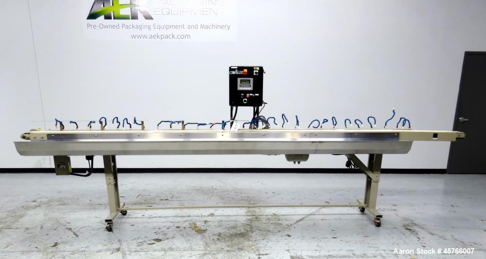 Used Conair TC Series Takeaway Conveyor, Model TC6-16. Approximate 6" wide x 192" long rubber belt, driven by a 1/3hp gear motor with a Baldor drive. Includes a Pneumatic ejector system with accumula...