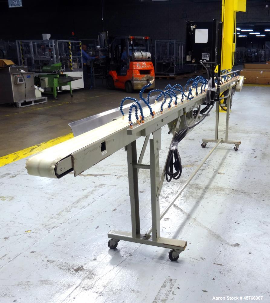 Used Conair TC Series Takeaway Conveyor, Model TC6-16. Approximate 6" wide x 192" long rubber belt, driven by a 1/3hp gear motor with a Baldor drive. Includes a Pneumatic ejector system with accumula...