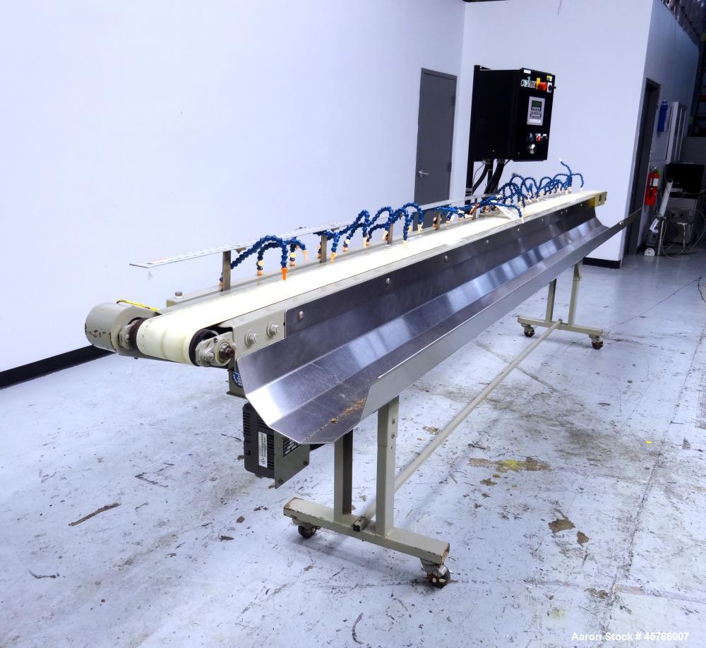 Used Conair TC Series Takeaway Conveyor, Model TC6-16. Approximate 6" wide x 192" long rubber belt, driven by a 1/3hp gear motor with a Baldor drive. Includes a Pneumatic ejector system with accumula...